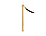 elegance stanchion with a crown top, fixed base, and a polished brass finish